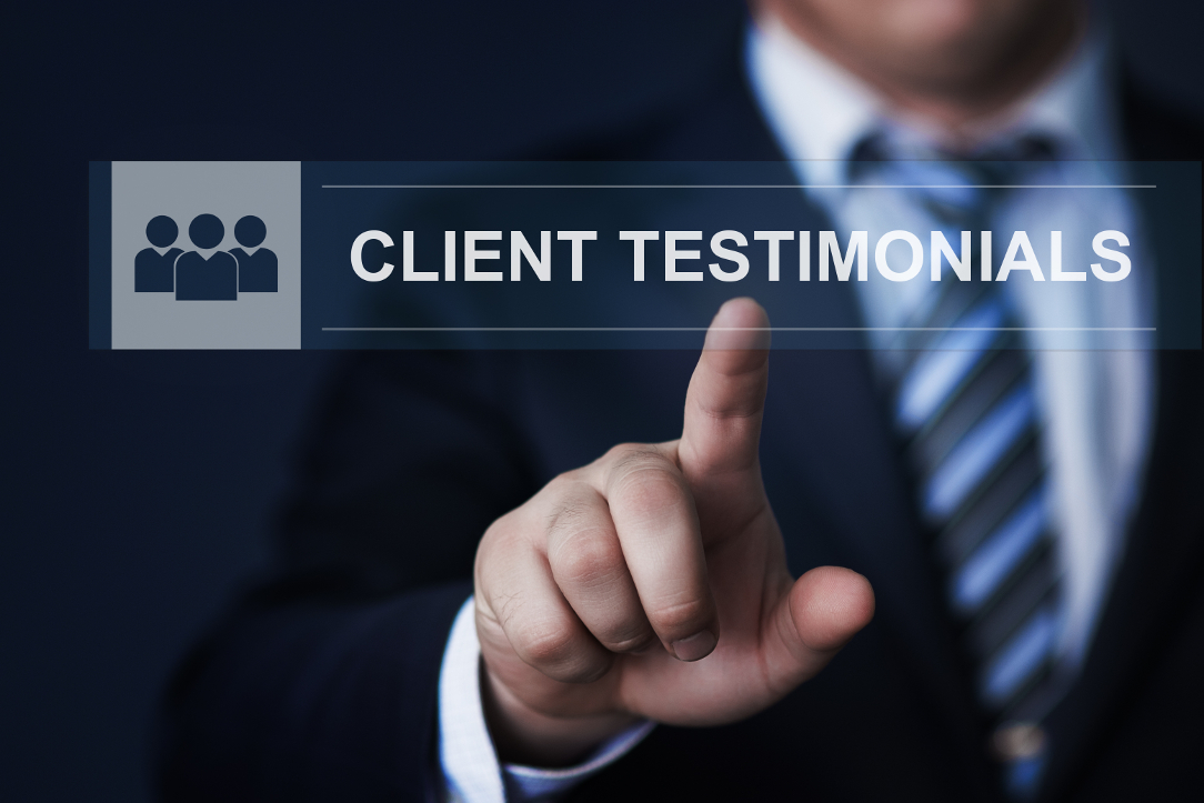 A man finger clicking on Client Testimonials